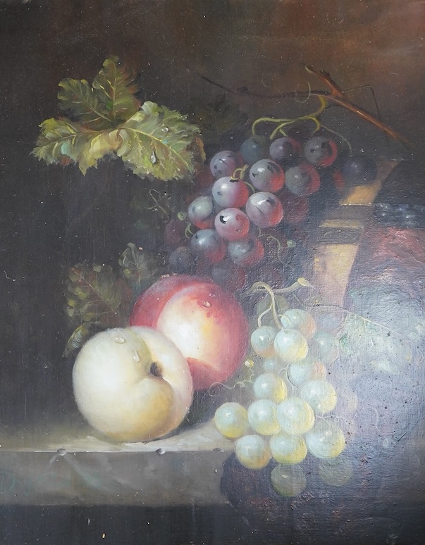 A painted porcelain plaque, still life of fruit, housed in an ornate gilt frame, overall 35 x 30cm